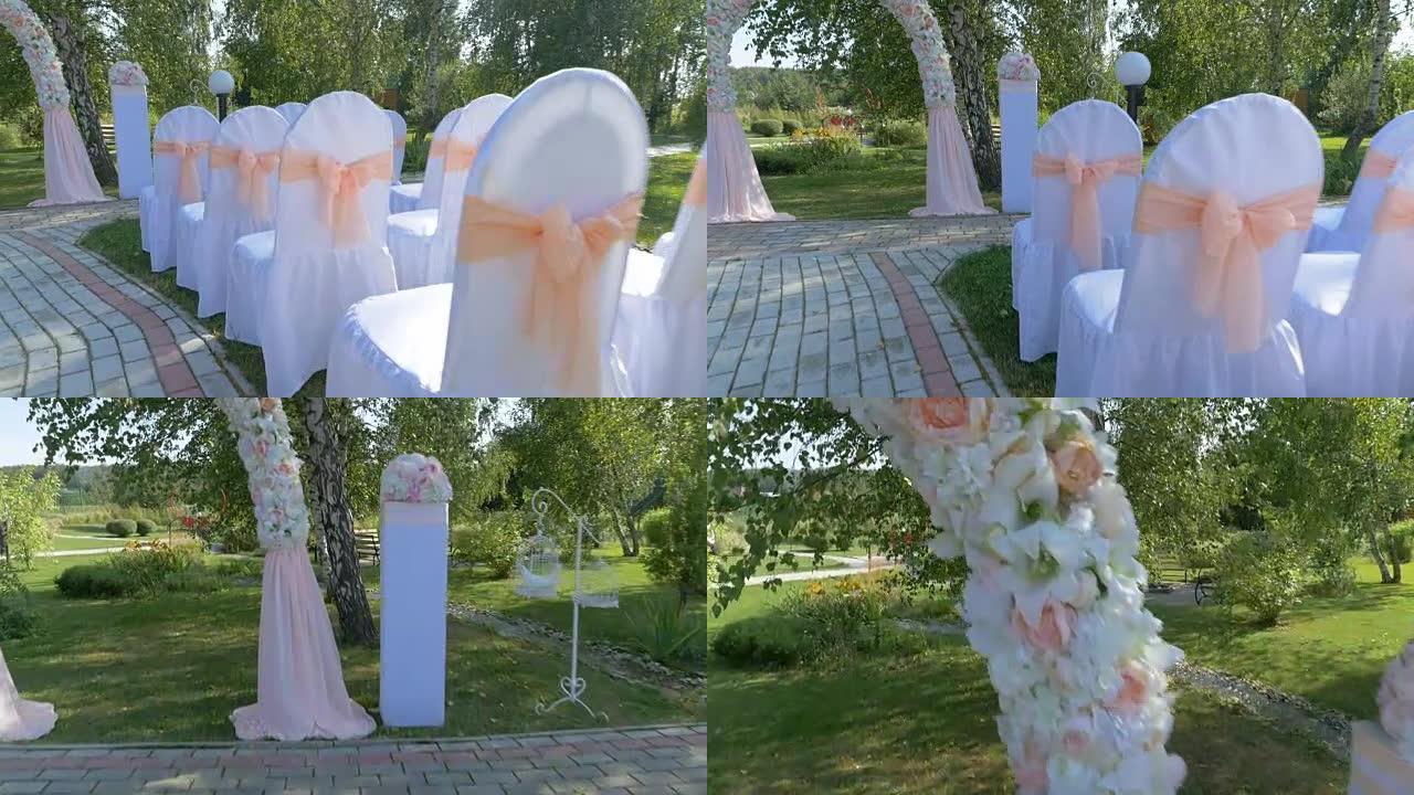 婚礼上装饰成排的椅子。