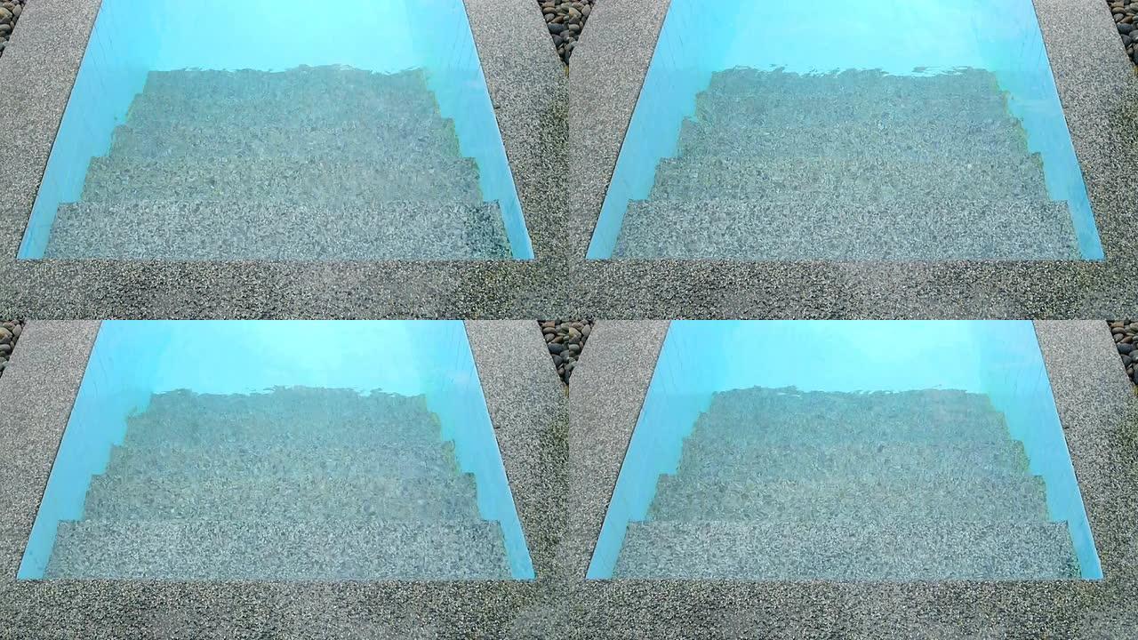 游泳池边缘的石材装饰