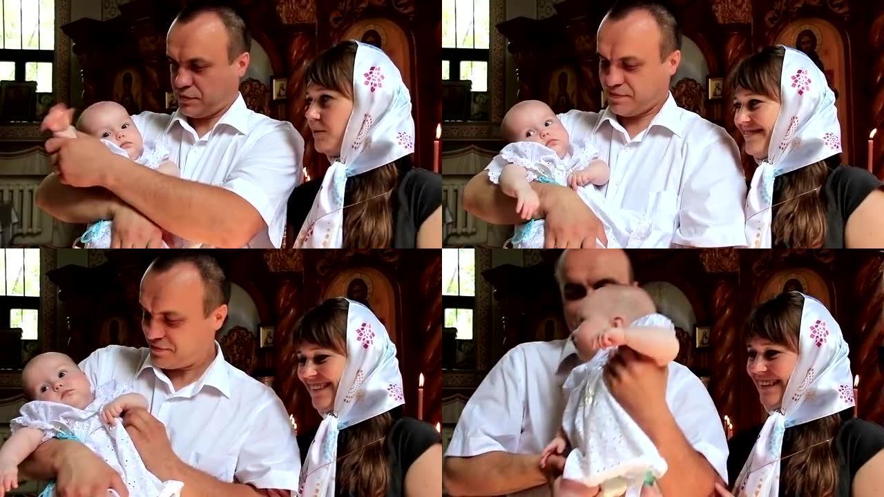 东正教教堂的母亲和父亲带着婴儿