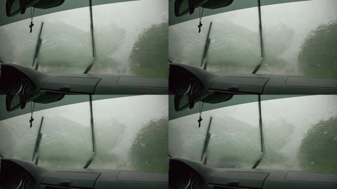 透过汽车挡风玻璃看到雨水