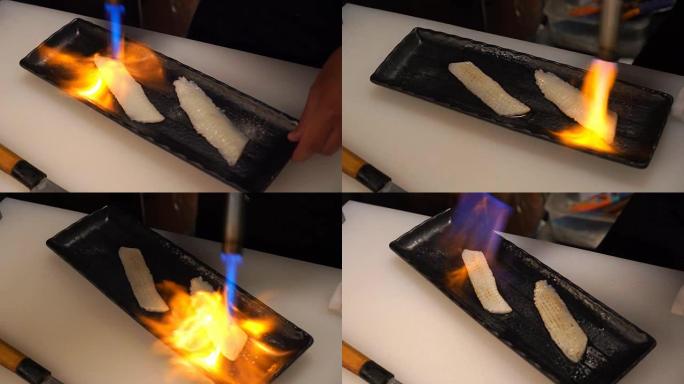 厨师用火炬烧恩川寿司。