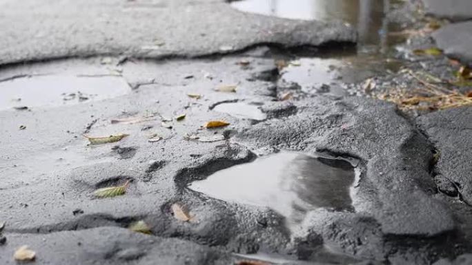 坏沥青坑是大户外水坑雨路