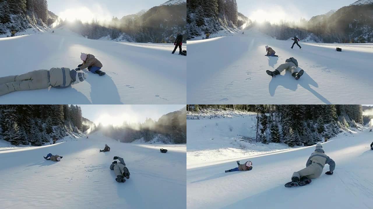 三个小女孩在雪地上滚动，翻滚，转弯，跋涉，徒步射击