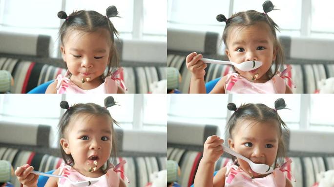 可爱的小女孩吃食物