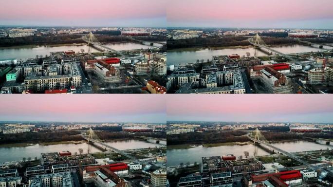 在波兰华沙的维斯瓦河，哥白尼科学中心，圣十字电缆桥和PGE Narodowego竞技场的空中拍摄。全