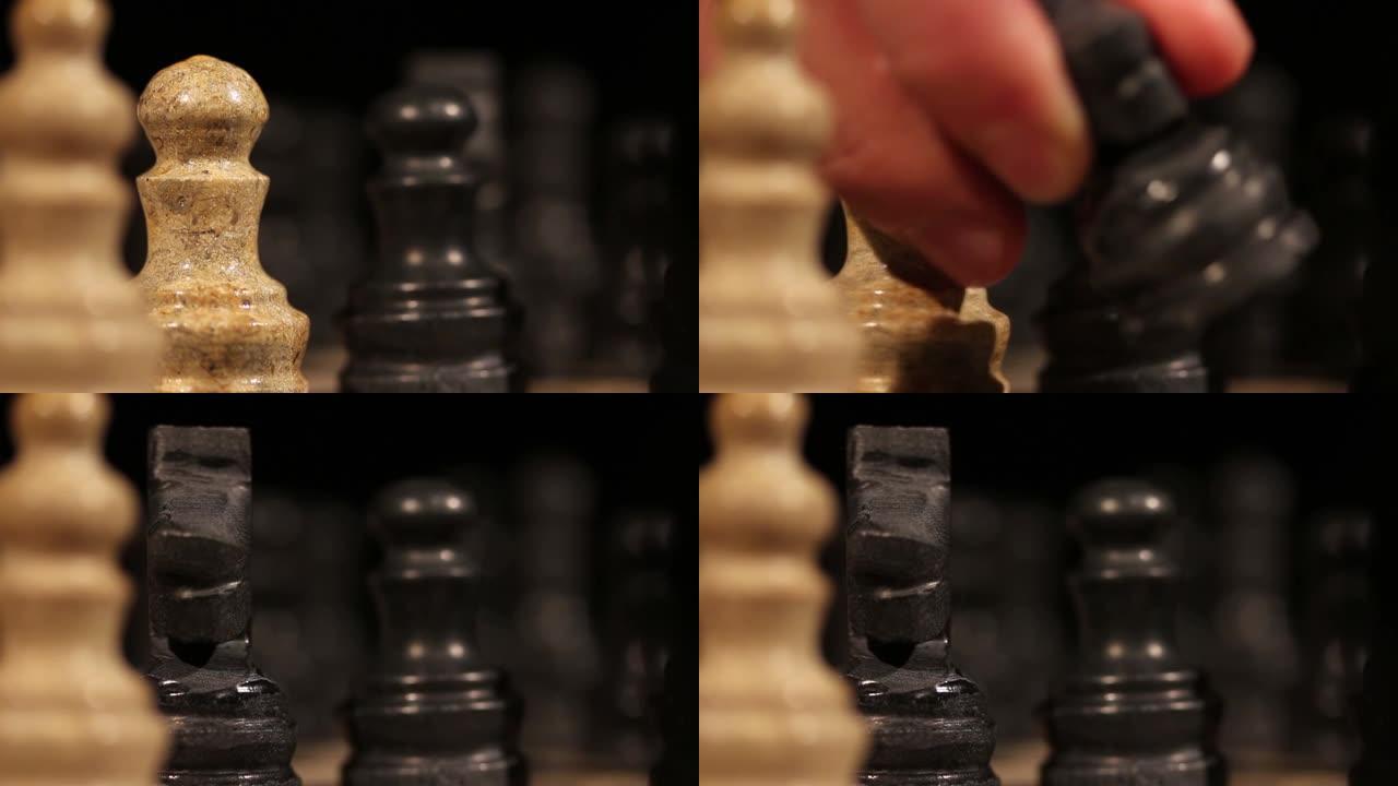 在国际象棋比赛中，一只白色棋子被黑骑士袭击的特写镜头