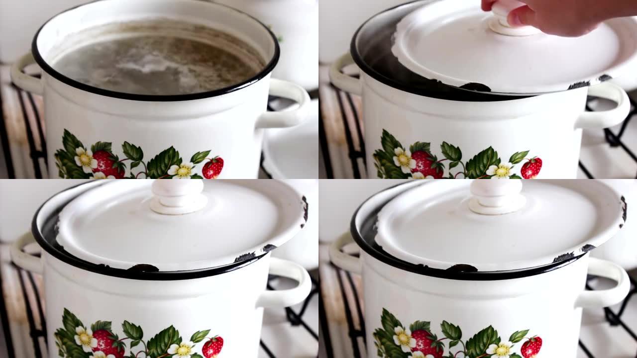 用肉汤平底锅，女性的手可以防止肉汤