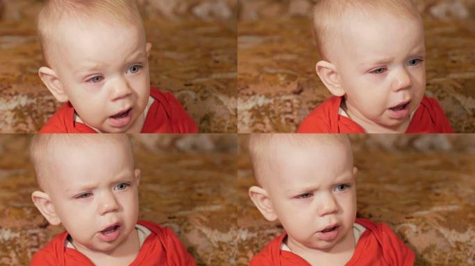 过敏的漂亮婴儿。红肿的眼睛。这个男孩在哭泣，与疾病作斗争。孩子1年。特写