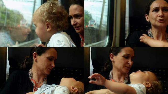 在火车上随意偷拍母亲和婴儿的照片。妈妈在通勤时亲吻疲惫的婴儿。婴儿想睡觉
