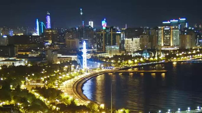 夜晚海边大城市大都市的全景。阿塞拜疆巴库。时间流逝
