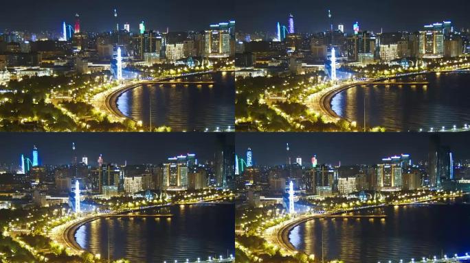 夜晚海边大城市大都市的全景。阿塞拜疆巴库。时间流逝