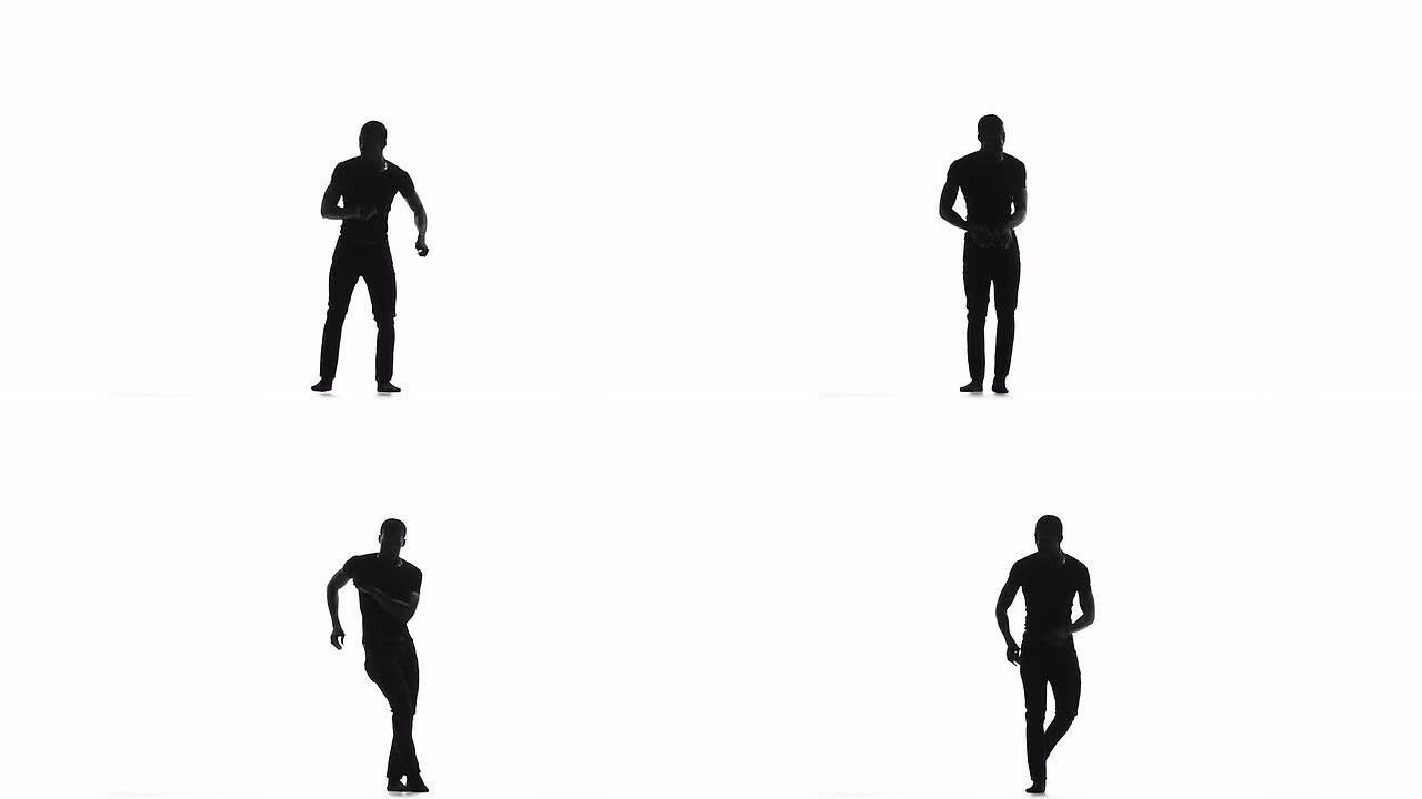 美国黑人男舞者在白色的缓慢动作的剪影上跳拉丁舞