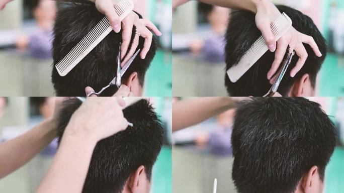 一个男人在理发师剪头发