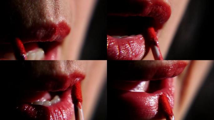 女人用口红涂嘴唇