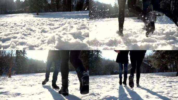 情侣在雪地公园跑步