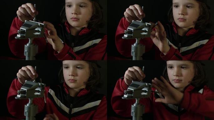 在实验室工作的可爱的孩子的4k镜头-夹紧螺栓
