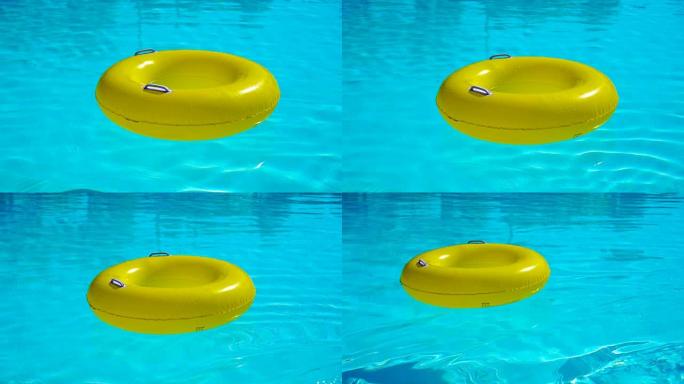 带有明亮黄色充气环的游泳池