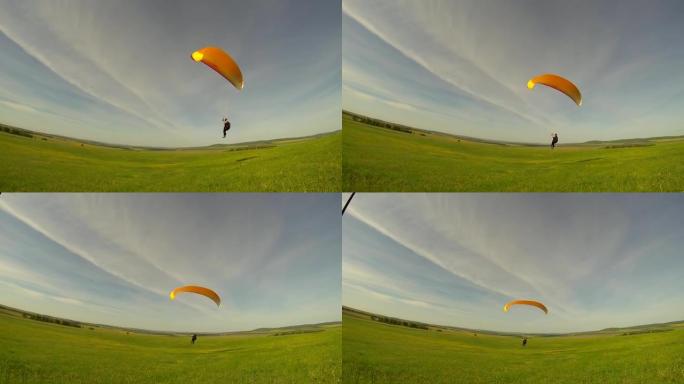 在蓝天中滑翔伞，降落到地球