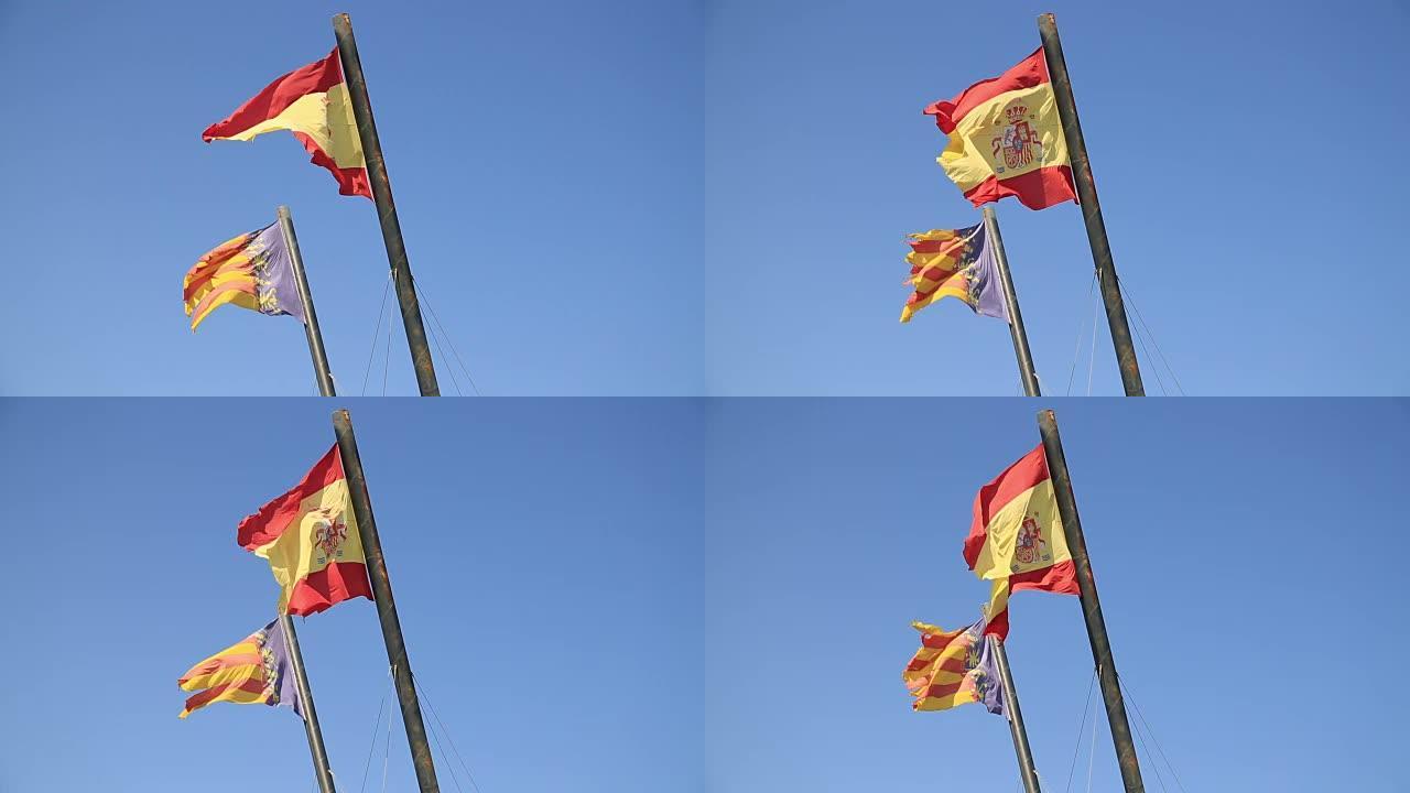 西班牙和瓦伦西亚的旗帜在蓝天