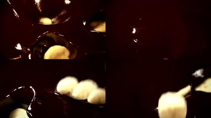 香蕉掉入巧克力的两个视频-真正的慢动作