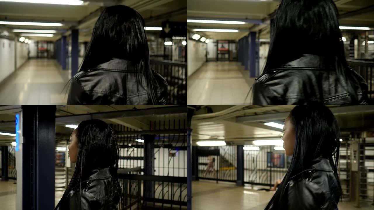 乘坐纽约地铁的年轻女子