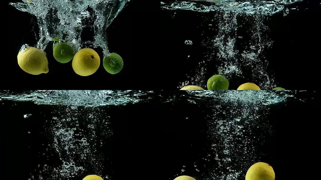 黄色和绿色柠檬，柑橘柠檬汁，柑橘金叶，黑色背景下落水的水果，慢动作4K