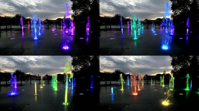 用彩虹色点燃的喷泉