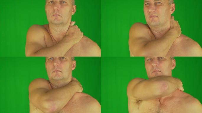 男人揉脖子和肩膀的极端特写镜头。