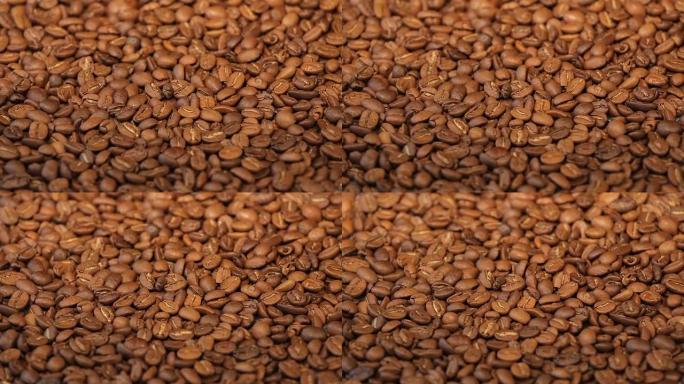 咖啡豆堆的缓慢旋转。咖啡豆特写。可循环旋转