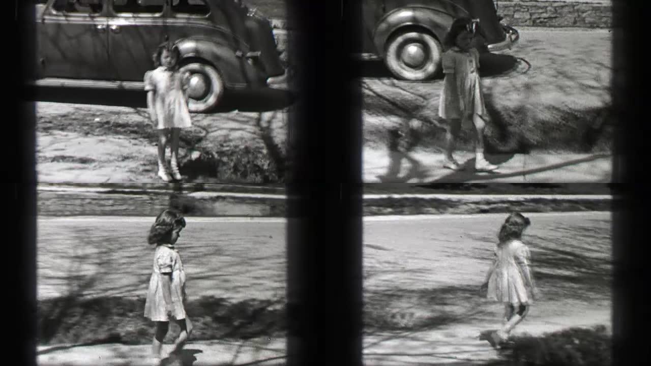 1939: 富有的年轻女孩波浪状卷曲长刘海发型娃娃关闭车门走回家。