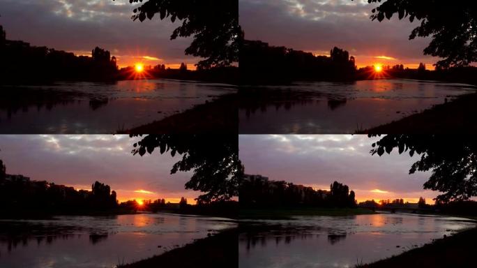 乌兹哥罗德背景下的河岸日落