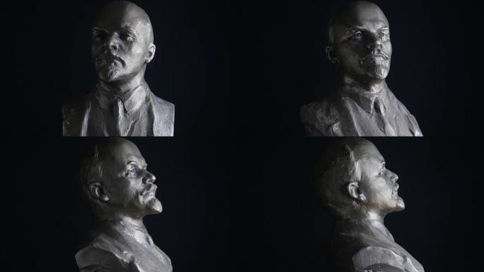 黑色背景上的弗拉基米尔·列宁的旋转肖像雕塑。