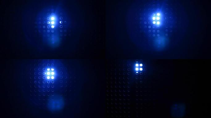 探照灯穿过格子发出的蓝色射线