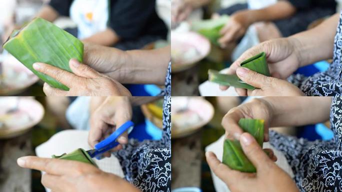 泰国高级妇女制作毛绒面团金字塔。华欣农历新年泰国甜点