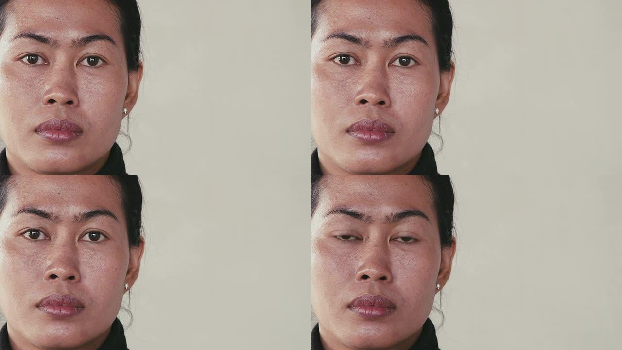 年轻的亚洲妇女的肖像看着相机，情绪，感觉