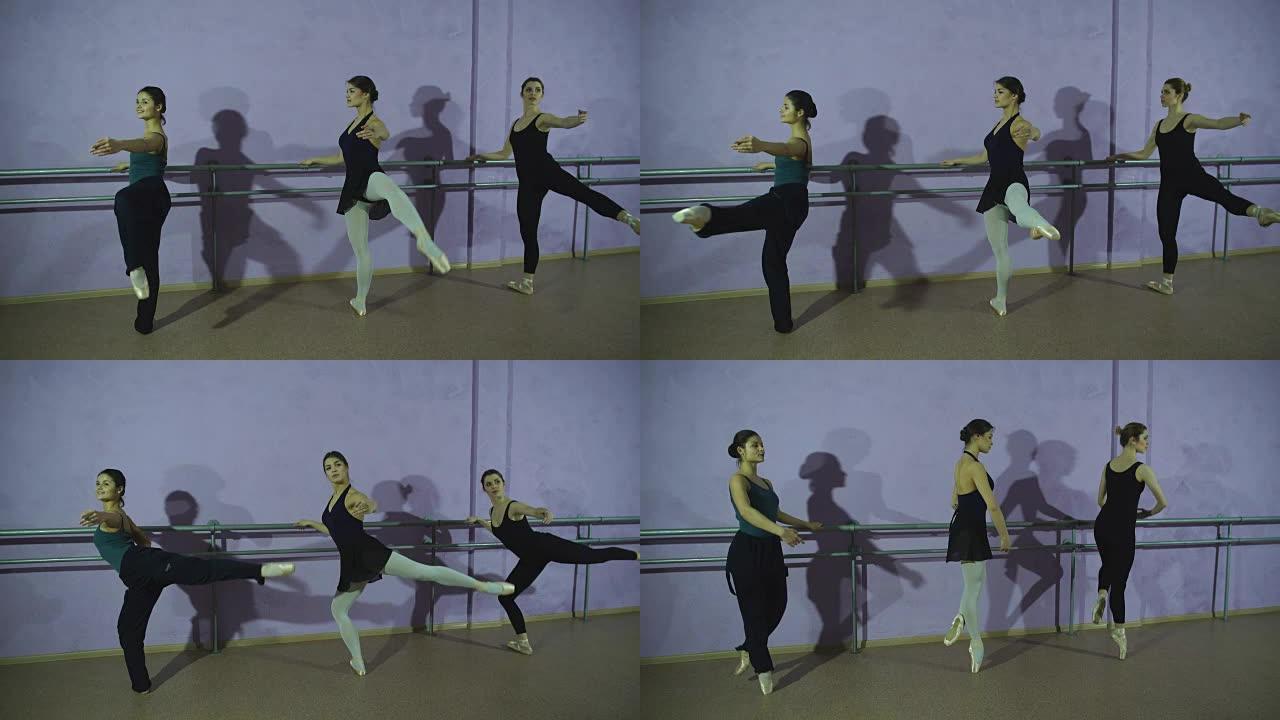 三名芭蕾舞演员在舞蹈工作室的芭蕾舞演员中练习