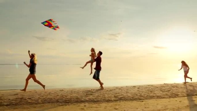 妈妈和孩子们玩风筝。孩子们在海滩上跑步很开心，无忧无虑。快乐的童年