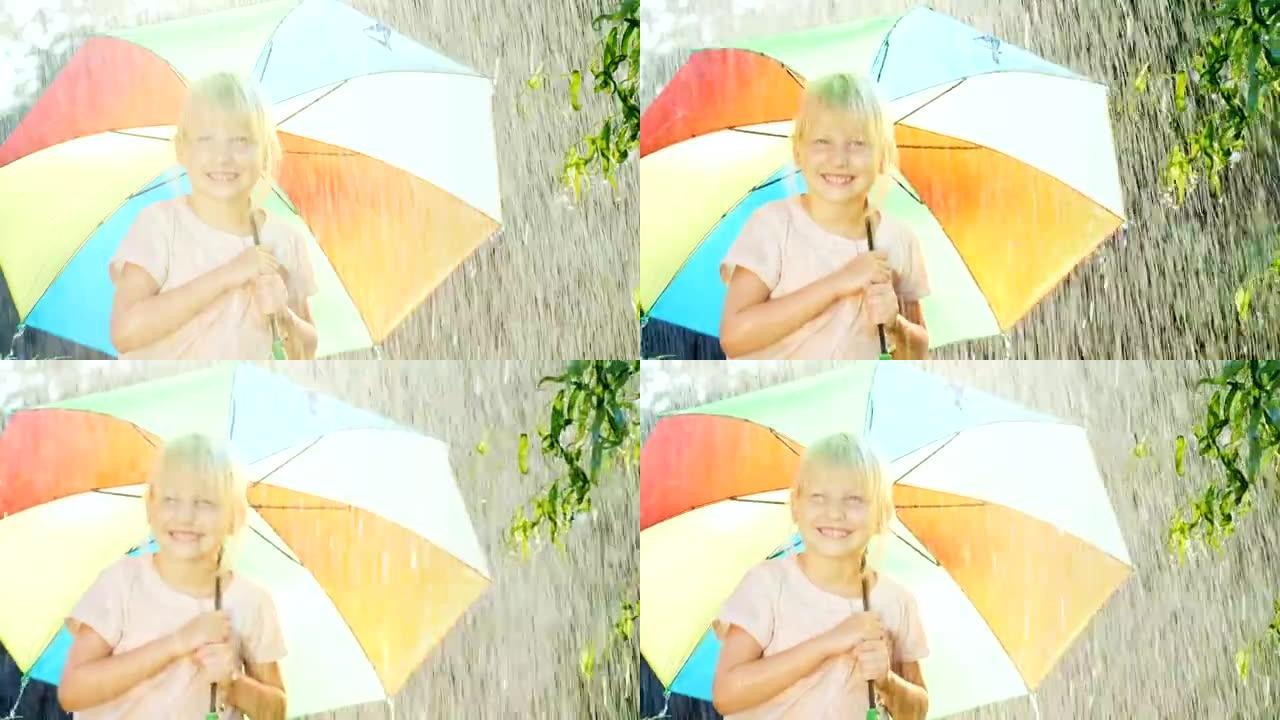 无忧无虑的女孩五年欢喜夏雨。站在彩色雨伞下