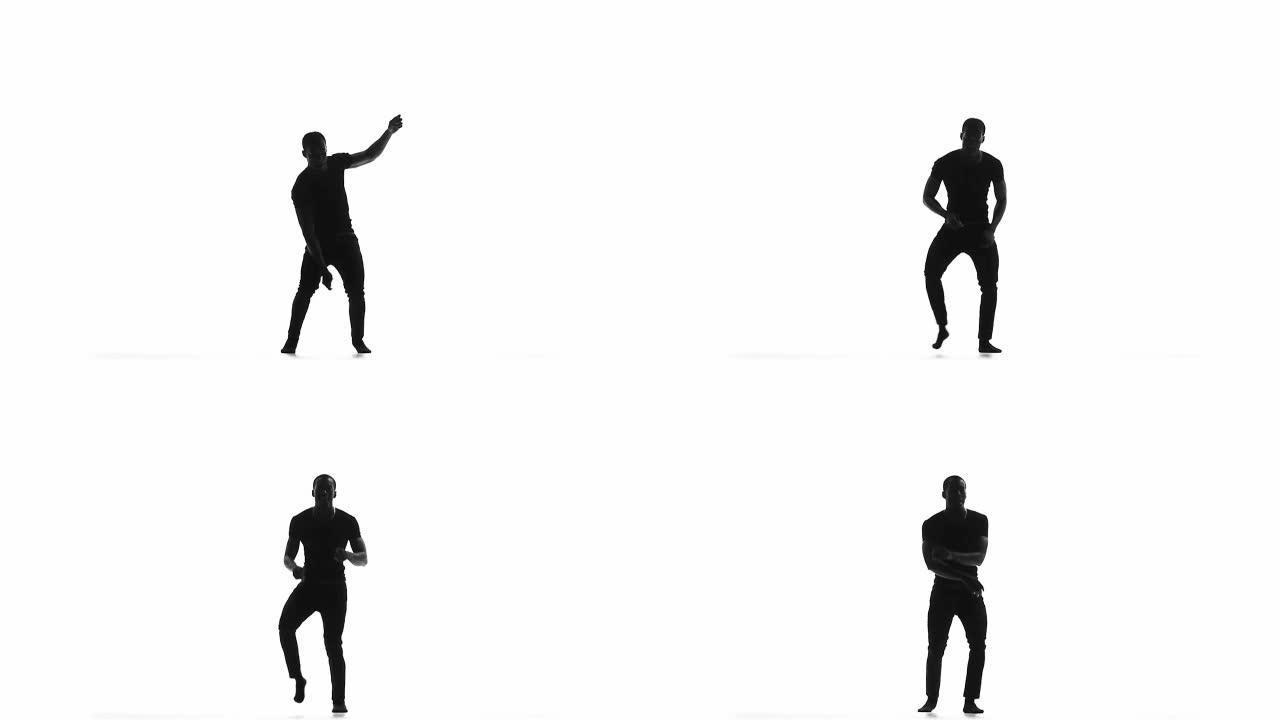 美国黑人男舞者继续在白人的慢动作剪影上跳拉丁舞