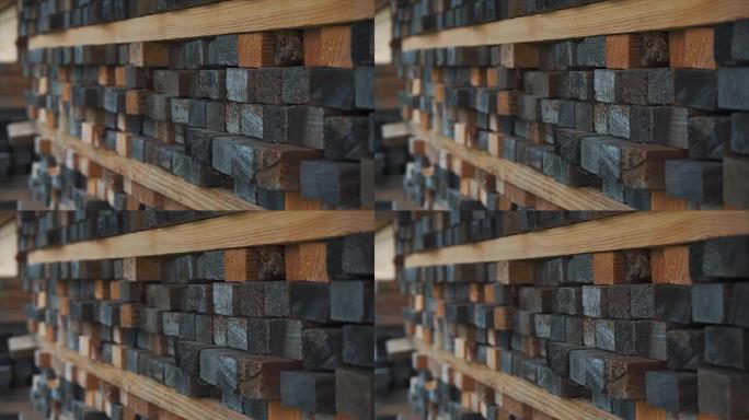 木条的方形末端的背景。背景和纹理的木材建筑材料。特写。一堆木条。小景深。家具行业的胶合板