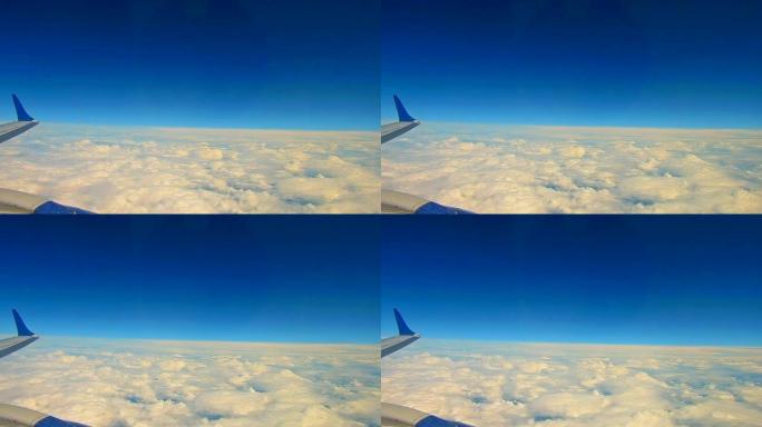 飞过云层，乘飞机旅行。通过飞机窗口查看，背景纹理