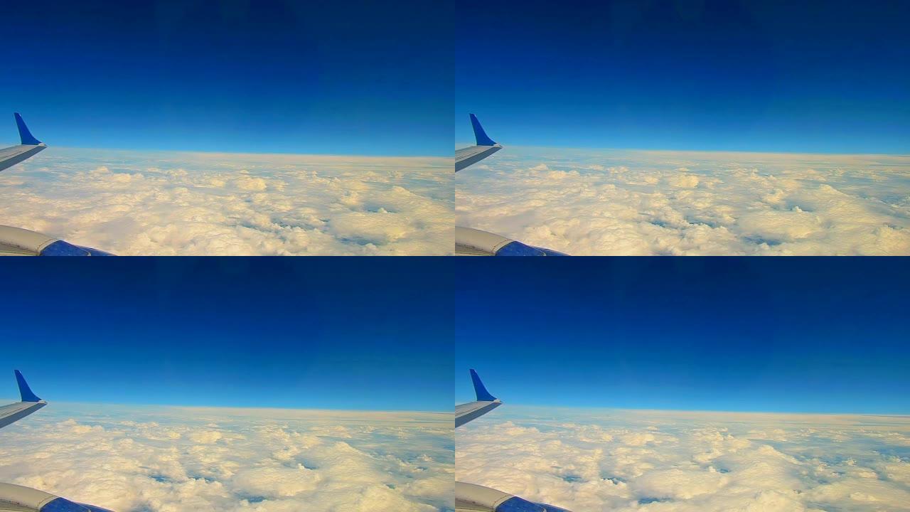 飞过云层，乘飞机旅行。通过飞机窗口查看，背景纹理