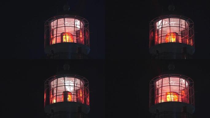 夜晚有红灯的灯塔，特写镜头。静态，慢动作60 fps。