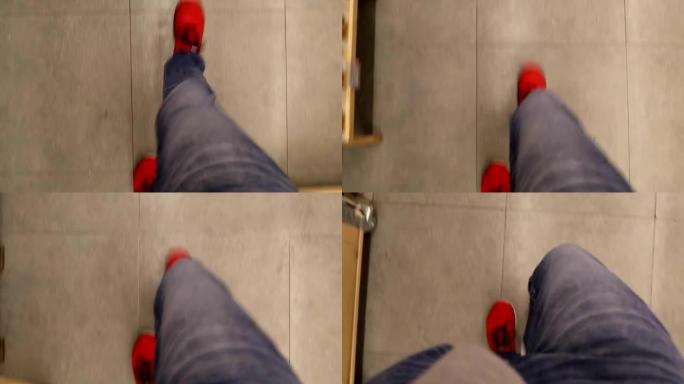 穿着红鞋POV在商店里行走的脚