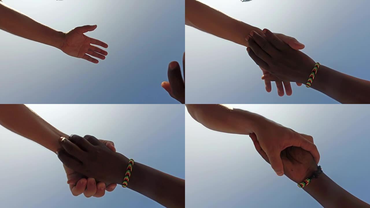 两个多元文化种族的平等握手