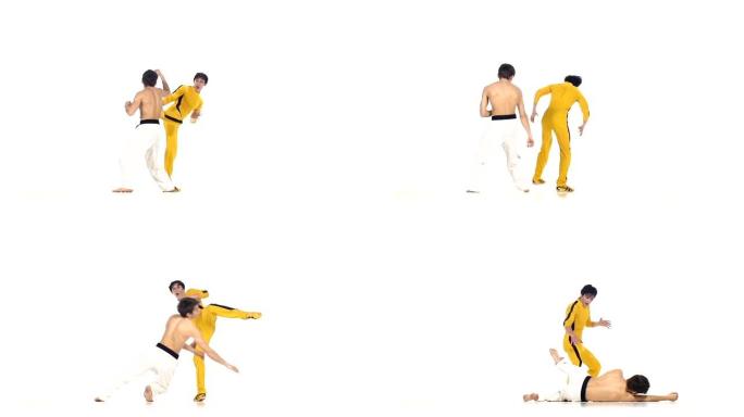 空手道和跆拳道对打:打击。慢动作，黄色衣服的空手道选手之一