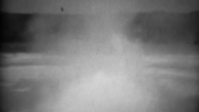 1937: 上间歇泉盆水剧烈沸腾气泡吐出和冒烟。
