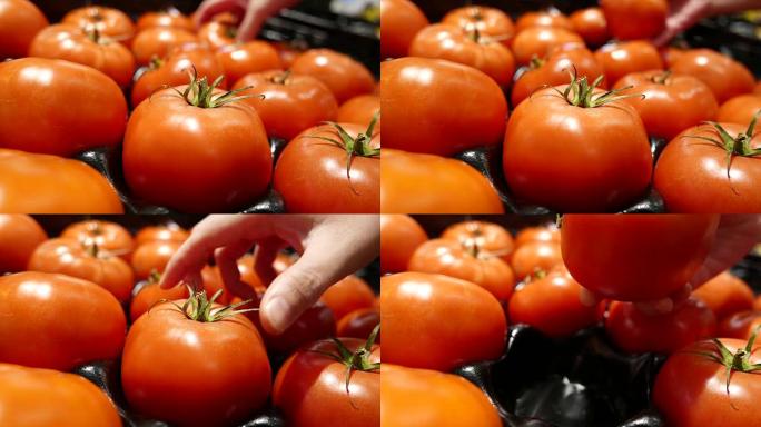超市内女人手摘番茄的动作
