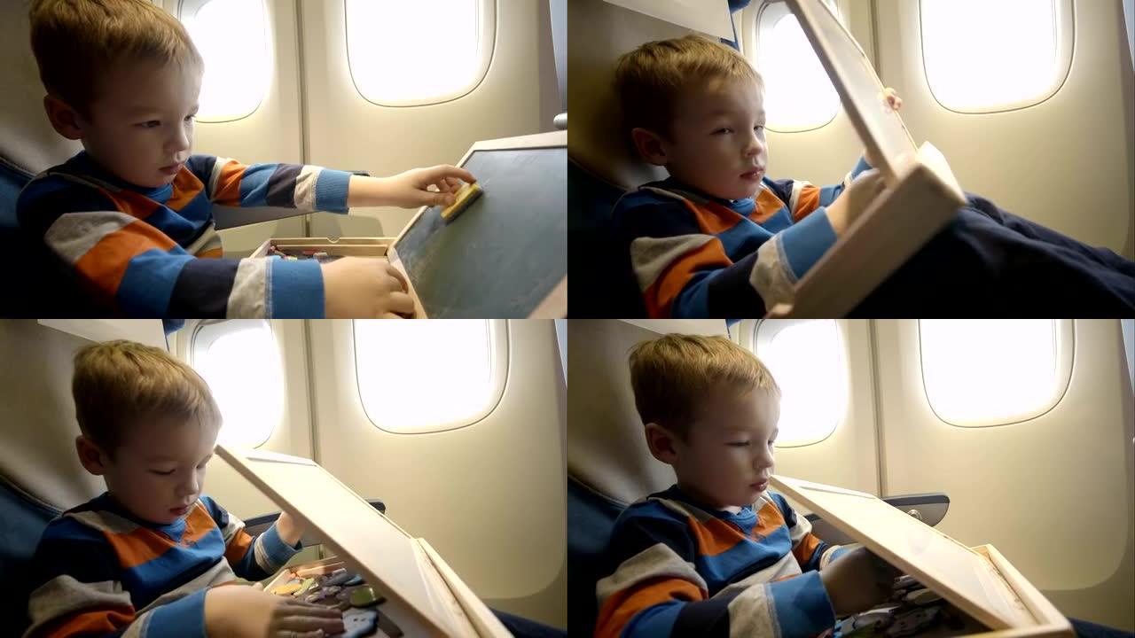 带木箱的飞机上的小男孩