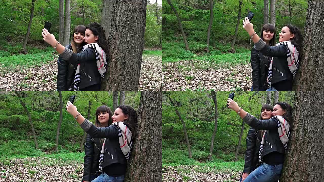 秋季公园两个快乐青少年的智能手机自拍照片。索尼uhd steadycam拍摄，股票视频